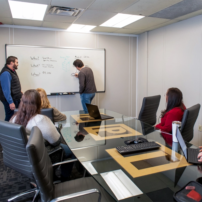 Landaal employees in conference room