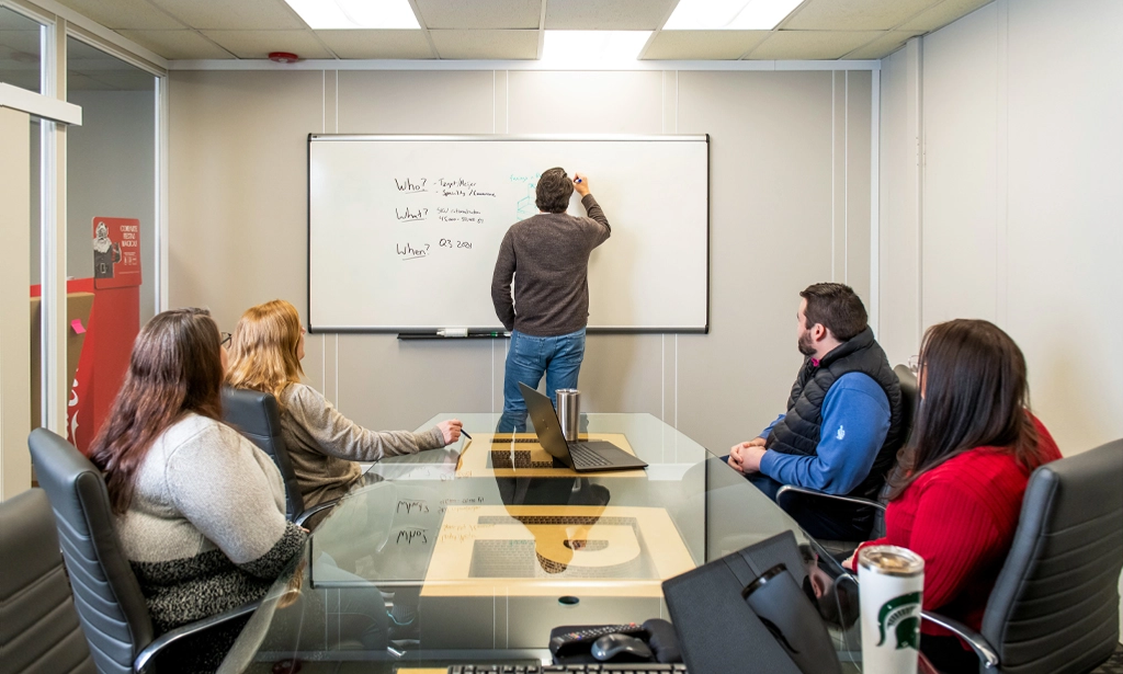 Landaal employees in conference room